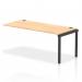 The photo features a sleek and functional Dynamic Bench Desk Add On Unit, part of the Impulse Bench Single Row Extension Kit. The unit has a black frame and is paired with a versatile maple office bench desk. Perfect for creating an organized and modern workspace.