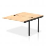 The picture showcases a stylish and modern bench desk with sleek black frame and a vibrant maple desk surface. The desk comes with dynamic add on units, making it perfect for office spaces.