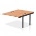 A sleek and modern office set-up, the dynamic bench desk add on units in this image are perfect for maximizing space and encouraging collaboration. The black frame and oak desk create a professional yet stylish look, while the B2B Extension Kit adds versatility to the set-up.