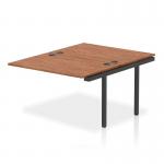 A sleek and modern office desk setup, featuring add-on units and an extended kit for extra workspace. The black frame contrasts beautifully with the warm walnut finish, creating a dynamic and professional look.
