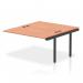 The picture shows a modern dynamic bench desk add on unit, specifically the Impulse Bench B2B Extended Kit 1400 with a sleek black frame. The office bench desk has a durable beech surface, creating a professional and functional workspace. This add on unit is perfect for any contemporary office setting.