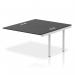 This photo showcases a sleek and modern office setup with dynamic bench desks and add-on units. The silver frame adds a touch of elegance, while the black desktop provides a professional look. The compact size of the impulse bench makes it perfect for a busy and productive work environment.