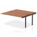 The photograph showcases a sleek and modern dynamic bench desk, complete with add on units and impulse bench B2B extension kit. The black frame and elegant walnut wood make for a sophisticated and professional look, perfect for any office space.