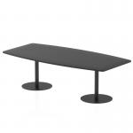 The photograph captures a sleek and sophisticated poseur table from Italia, standing at 2400mm in length with a glossy black tabletop and matching 725mm high black legs. Its dynamic design exudes elegance and modernity.