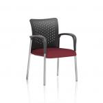 In the picture, a dynamic visitor at the academy can be seen seated on a nylon back bespoke coloured chair with arms. The seat is in a refreshing ginseng and chili shade, adding a pop of color to the space. This visitor is ready to engage and learn with enthusiasm.