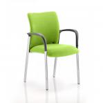 In the picture, a visitor at Dynamic Visitors Academy can be seen sitting on a chair with bespoke colours of myrrh green on the back and seat. Their arms are resting comfortably on the armrests, creating a dynamic and comfortable seating experience.