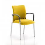 In the image, a visitor at Dynamic Visitors Academy is captured with outstretched arms, sitting on a bespoke colour-back and seat. The vibrant shade of Senna Yellow adds a pop of color to the scene.