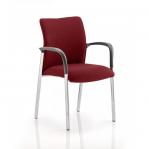 The picture showcases a dynamic visitor at the Visitors Academy with arms spread out. The back and seat have a unique bespoke colour, reminiscent of ginseng and chilli. KCUP0038 stands in the background, adding to the vibrant atmosphere.