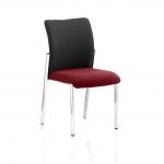 A photo of a Dynamic Visitors Academy visitor shows a person without arms sitting on a black fabric back seat with a bespoke colour design. The seat is adorned with ginseng and chilli accents, adding a touch of excitement to the overall aesthetic.
