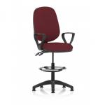 This photograph showcases a modern and ergonomic workspace with the Dynamic Draughtsmans Chairs Eclipse Plus II Lever Task Operator Chair. The high-rise draughtsman kit, loop arms, and bespoke colour back and seat add a touch of style and functionality, while the ginseng and chilli tones provide a pop of color.