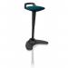The photograph captures a sleek, modern spry stool with a black frame and a bespoke seat in maringa teal. Its dynamic posture accessories provide comfort and support, making it a stylish addition to any space.