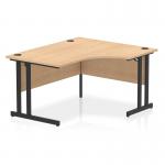The picture showcases a sleek and modern Dynamic Right Hand Desks Impulse 1400mm Right Crescent Office Desk with a Maple Top and Black Cantilever Leg. The desk has a slight curve on the right side, giving ample space for writing and working. It exudes a professional and efficient vibe, perfect for any office setting.
