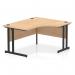 The picture showcases a sleek and modern Dynamic Right Hand Desks Impulse 1400mm Right Crescent Office Desk with a Maple Top and Black Cantilever Leg. The desk has a slight curve on the right side, giving ample space for writing and working. It exudes a professional and efficient vibe, perfect for any office setting.