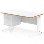 The picture features a sleek, white top desk with a natural wood edge and scalloped edge detailing. The legs are cable managed and there is a fixed 2-drawer pedestal for storage. The desk measures 1400 x 800mm and has a modern, dynamic appearance.
