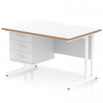 The Dynamic Pedestal Desk Oslo features a sleek, modern design with a scalloped edge and natural wood accents. The white top and cantilever leg offer a clean and spacious workspace, while the 3-drawer fixed pedestal provides ample storage. Perfect for any contemporary office setting.