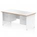 This photograph shows a modern and stylish office desk, with a white top and natural wood edge. The desk is 1600 x 800mm in size and features a scalloped edge and straight design. The white panel end legs give it a sleek and professional look. There are 2 x 2 drawer fixed pedestals attached to the desk for additional storage space.