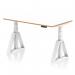 The photo shows a sleek and modern height adjustable desk in white with a natural wood edge. The frame is also white and has a piste foot for added stability. The desk is spacious at 1400mm and is designed for a dynamic sit-stand work style.