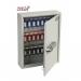 This picture features a sleek and sturdy Phoenix commercial key cabinet, model KC0601N. It has a dark grey finish with a net code electronic lock for added security. The cabinet has a total of 42 hooks, providing ample space for storing and organizing keys. The electronic lock ensures quick and easy access, while the durable construction ensures long-lasting use. This key cabinet, identified by the model PX0048, is perfect for any office or commercial space in need of a secure and organized key storage solution.