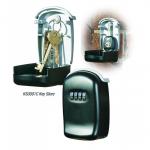 The picture shows a sleek, black Phoenix Key Store key safe with a combination lock. Its compact size makes it perfect for storing and organizing keys for your home or office. The Phoenix Key Accessories logo is visible on the front.