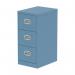 This photograph features a sleek Silverline Steel Filing Cabinet in a charming pastel blue color. With three spacious drawers, the Qube cabinet offers ample storage for your filing needs. The silver handles and clean lines add a modern touch to any office space.