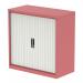The photo shows a sleek Silverline Tambour Cupboard in Qube 1000mm size. The unique combination of antique pink and satin white gives it a modern look. It features a side opening tambour door and is fully equipped with inner shelves.