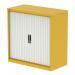 The photograph captures a sleek and modern Silverline Tambour Cupboard in a vibrant lemon yellow and crisp satin white finish. With a height of 1000mm, the Qube design features side tambour doors and shelves, providing functional storage space in any office setting.