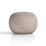 The image shows a cream boucle fabric footstool with a plush cushion on top. The footstool is part of the Phoebe collection and has a dynamic design with soft curves and sturdy legs. The texture of the boucle adds depth and dimension to the piece, creating a cozy and stylish addition to any living space.