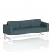 The photograph captures the Elegant and Modern appearance of the Dynamic Sofas Brixworth Sofa, featuring a sleek 3 seater design with stylish White Legs and chic X2 Fabric upholstery. The angular lines and geometric detailing create a striking piece that adds a touch of sophistication to any living space.