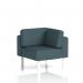 The dynamic modular seating features a corner unit with white legs and is upholstered in a geometric X2 fabric. Its modern design and functional versatility make it a perfect addition to any space. The unique polygon shape adds visual interest and allows for endless seating configurations.