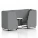 This picture shows two dynamic seating booths in Brixworth style. The booths feature sleek black legs and a white table with black legs. The upholstery is a chic synergy fabric in partner panels. A coordinating sofa is also included in the picture.