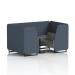 This photo showcases a stylish and modern seating option, featuring dynamic seating booths from Brixworth. The 4-seater booth has sleek black legs, paired with a black table and rivet fabric in crucible panels. The prime sofa adds a touch of elegance to the overall design.