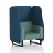 The photo features a sleek and modern Dynamic Booth, with a single seat in Brixworth design. The booth has black legs and is upholstered in Sumi fabric. It is complemented by Uto panels and a Handa Sofa in SF002010 design, creating a stylish and versatile seating option.