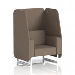 The photograph features a modern, customizable Dynamic Booths open 1 seater booth with white legs and Theory panels. The sofa is made from X2 fabric, giving it a sleek and stylish appearance. Perfect for any office or event space, this booth offers comfort and versatility.