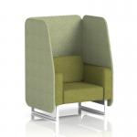 The photo captures a vibrant dynamic booth with a single seater open design. The white legs contrast beautifully with the rivet fabric and burnish panels. A stunning olive sofa adds a pop of color. Custom-made for Brixworth, this booth is truly one-of-a-kind.