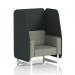 The photograph captures a stylish and modern 1 seater open booth from Dynamic Booths. Its design features white legs, charcoal panels, and a vitreous sofa, all made to order in Brixworth. The booth is covered in sleek rivet fabric, creating a chic and sophisticated look.