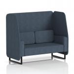 The photo features a stylish Dynamic Booths open booth with black legs and eye-catching rivet fabric. The Crucible panels add a touch of sophistication, while the two-seater sofa provides comfort and versatility. Perfect for any modern space.