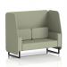 The photo captures the sleek and modern design of the Dynamic Booths - Made To Order Brixworth 2 Seater Open Booth. Its black legs provide a striking contrast to the neutral Main Line Flax fabric, while the Newbury Panels add texture and depth. The sofa, with its SF002086 details, exudes elegance and sophistication.
