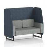The picture captures a stylish and modern open booth, with sleek black legs and unique rivet fabric. The booth features two comfortable seats and crucible panels, along with a prime sofa. This customizable design is perfect for any space.