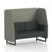 This photograph showcases a stylish Dynamic Booths 2 seater open booth with black legs, upholstered in rivet fabric and featuring vitreous panels. The charcoal sofa adds an elegant touch to this made-to-order piece from Brixworth.