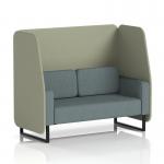 The picture shows a custom-made Brixworth 2-seater open booth with black legs, upholstered in Main Line Flax fabric. It features Newbury panels and a Westminster sofa, giving it a modern and stylish look. The design is sleek and sophisticated, perfect for any event or office space.