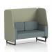 The picture shows a custom-made Brixworth 2-seater open booth with black legs, upholstered in Main Line Flax fabric. It features Newbury panels and a Westminster sofa, giving it a modern and stylish look. The design is sleek and sophisticated, perfect for any event or office space.