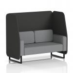 The photo captures a modern and sleek Dynamic Booth with mix panels and black legs. Its Synergy fabric adds a touch of sophistication and the open design can comfortably fit two people. The booth is custom-made, perfect for any contemporary space.