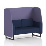The photograph shows a stylish and modern Dynamic Booths 2 seater open booth with sleek black legs. The booth features a stylish synergy fabric and can be customized with order panels. The booth also includes a matching sofa, creating a cohesive and stylish seating area.
