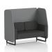 This picture shows the sleek and modern design of a Dynamic Booths open booth with black legs. The synergy fabric adds a touch of sophistication, while the partner panels and mix sofa provide versatile seating options. Perfect for any space in need of comfortable and stylish seating.