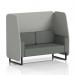 This image features a stylish open booth with black legs, upholstered in sumi fabric. The booth is designed for two people and includes Tokyo panels and a Kobe sofa. The sleek and modern design adds a dynamic touch to any space.