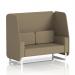In the image, you can see a sleek and modern 2-seater open booth with white legs. The booth features a beautiful Main Line Flax fabric and Bank panels, creating a dynamic and inviting aesthetic. The complementary sofa adds a cozy touch to the space.