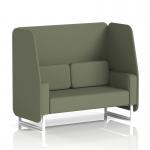 This image showcases a stylish and versatile 2-seater open booth with white legs, upholstered in a neutral Main Line Flax fabric. The modular design allows for dynamic arrangements, while the elegant monument panels add visual interest. The comfortable sofa invites relaxation and conversation.