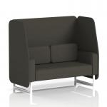 The photograph shows a stylish and modern Dynamic Booths 2 seater open booth with white legs, upholstered in Main Line Flax fabric. The booth features temple panels and a sofa, creating a sleek and chic look.
