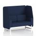 In the photo, a sleek and modern 2-seater open booth with white legs stands tall. The booth features matching alike panels and a comfortable sofa, all upholstered in synergy fabric. Its dynamic design is perfect for any modern space.