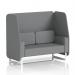 This photo features a sleek and modern Dynamic Booths open booth in Brixworth design. The 2 seater sofa has white legs and is upholstered in a stylish Synergy fabric. Partner panels and a matching sofa complete the look.
